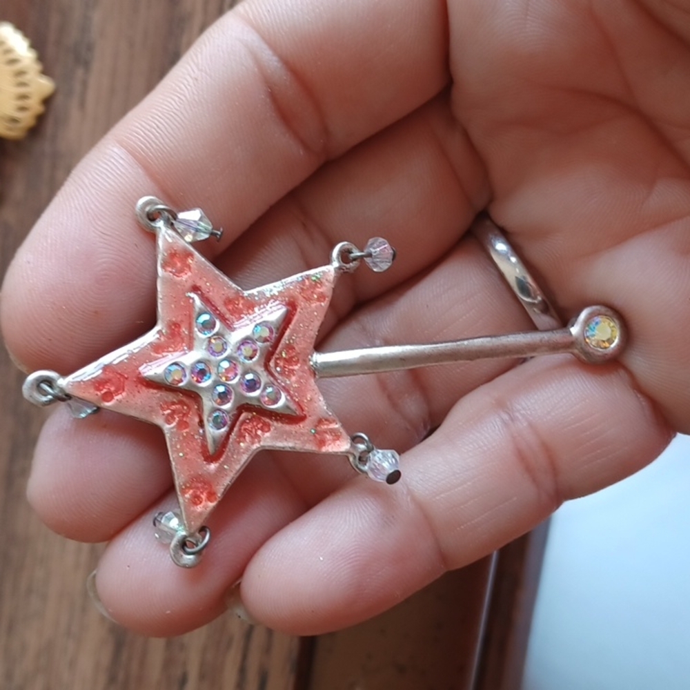 Star brooch. Silver-tone w red enamel and rhinestones,  approx 2.5" - 3"